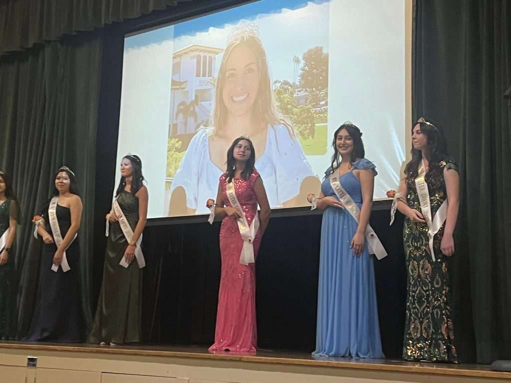 Students on stage at an Exeter Kiwanis scholarship presentation